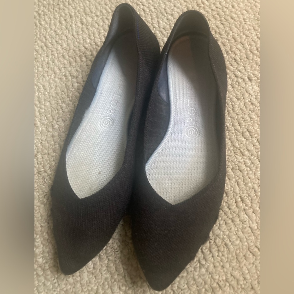 Rothys black The Point shoe with a solid sole. Worn but have some life left!